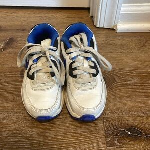 Little boy Nike sneakers.